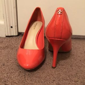 Bright orange coach heels
